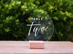 a glass table top with the words, table tyo on it