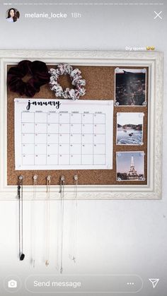 a cork board with magnets and pictures hanging on it's side, in front of a white wall