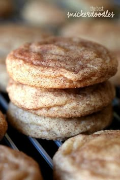 a stack of cookies sitting on top of a cooling rack