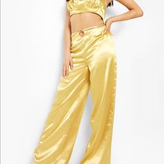 Nwt Size Us 0/ Size Uk 4 (Waist 25, Hips 34.5) (Bust 32) More Of A Brassy Gold Rather Than Yellow Shade And The Chain Can Be Adjusted On The Pants To Your Desired Look! Trendy Gold Bottoms For Parties, Casual Gold Wide Leg Bottoms, Gold Pants For Night Out In Summer, Gold Long Pants For Summer, Trendy Gold Wide Leg Pants, Glamorous Gold Bottoms For Night Out, Chic Fitted Gold Bottoms, Gold Bottoms For Summer Night Out, Gold Bottoms For Night Out In Summer