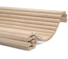 a close up of a wooden object on a white background