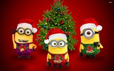 three minion characters standing in front of a christmas tree with the words minionss on it