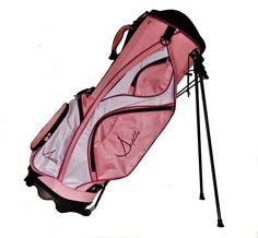 a pink and white golf bag with the name's logo on it, sitting in front of a white background