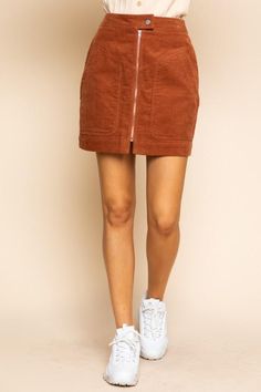 This corduroy mini skirt is a perfect match for a walk. Features high waist fit and an exposed front zipper with big patch pockets. High-Waisted Fit A-Line Short Length Button Closure Exposed Front Zipper Front Patch Pockets Back Welt Pockets Soft Corduroy Unlined 100% Cotton Hand Wash Cold, Lay Flat to Dry Imported Small: Length 17" Waist: 27" Medium: Length 17.5" Waist 29" Large: Length 18" Waist 31" . Garage Corderoy Skirt, Casual Corduroy Mini Skirt With Pockets, Corduroy Lined Skirt Bottoms For Fall, Brown Corduroy Casual Mini Skirt, Casual Brown Corduroy Mini Skirt, Casual Brown Corduroy Skirt, Brown Corduroy Mini Skirt For Fall, Fall Corduroy Mini Skirt With Lining, Trendy Corduroy Mini Skirt