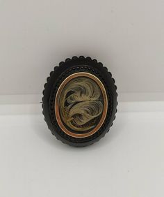 Antique Victorian hair brooch. Made in the UK in the mid 19th century, the stylised blonde hair is set in a gold-rimmed jet frame. Victorian Hair Jewelry, Jet Hair, Victorian Hair, Hair Brooch, Victorian Hairstyles, Antique Victorian, Hair Jewelry, Brooch Pin, Favorite Jewelry