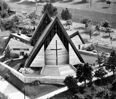 an aerial view of a church in the middle of nowhere