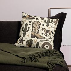 a pillow with cowboy boots and stars on it