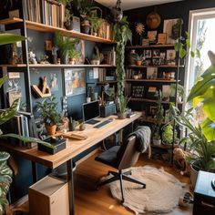 a home office with lots of plants and bookshelves