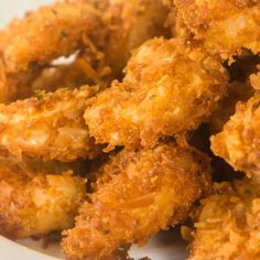 some fried food is on a white plate