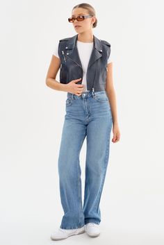 Embrace retro flair with the AMALIA 80's Leather Vest. Featuring an asymmetric zipper closure, this vest showcases a straight body with fixed belt loops and functional zip pocket details. Perfect for layering, it adds a touch of edgy sophistication to any outfit. Short Cuir, Leather Biker Vest, Biker Vest, Leather Outfits, Vest Outfits, Leather Outfit