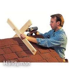 a man working on a roof with a hammer