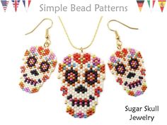 three pairs of beaded sugar skull earrings