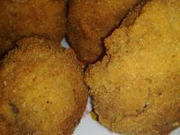 several fried food items on a white plate