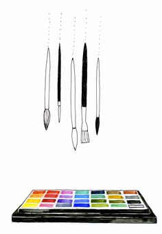 an artist's palette with five different colored brushes hanging from it