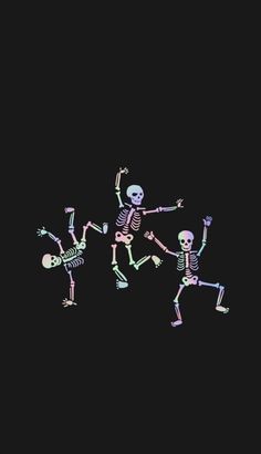 three skeletons are dancing in the dark