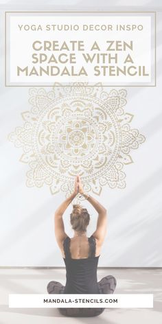 a woman sitting on the floor doing yoga with her hands up in front of her head