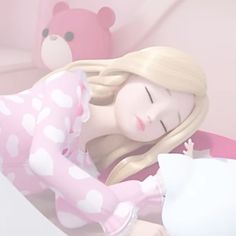 a woman laying in bed next to a teddy bear with her head on the pillow