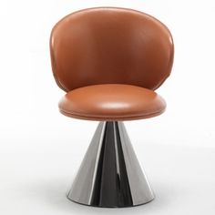 a brown leather chair sitting on top of a metal base