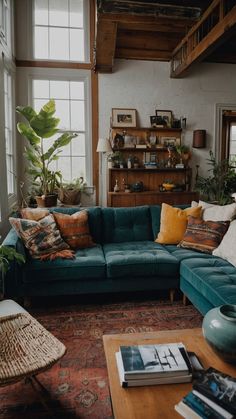 a living room filled with lots of furniture and plants on top of a wooden table