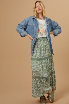 Embrace bohemian style with this flowy floral maxi skirt. The delicate floral print adds a touch of femininity and romance, while the smocked elastic waistband ensures a comfortable and flattering fit. The intricate lace details add a touch of luxury and make this skirt perfect for any occasion. Floral Dresses Outfit, Long Fall Skirts, Edgy Floral Outfits, Cardigan With Maxi Skirt, Flowy Feminine Style, Patterned Maxi Skirt, Modest Bohemian Outfits, Dress With Shacket, Mennonite Fashion