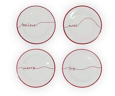 four red and white plates with writing on them