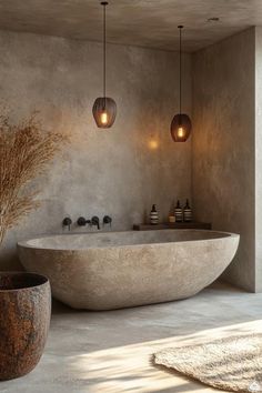 a large bath tub sitting next to a plant in a bathroom