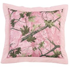 pink camo pillow with green leaves on the front and back, in soft pink