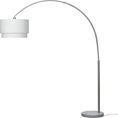 a floor lamp with a white shade on it