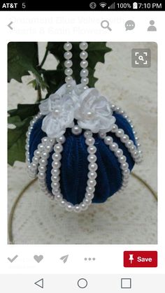 an ornament made out of pearls and beads