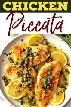 chicken piccata with lemons and capers on a white plate