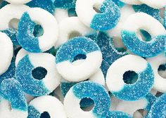 blue and white donuts with sprinkles on them