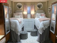 two twin beds in a small room with mirrors on the wall and white furnishing