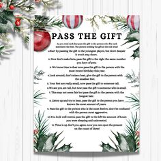 a christmas card with the words pass the gift on it and holly wreaths around it