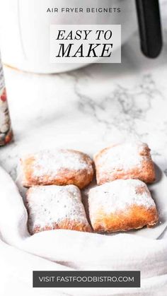 powdered sugar cookies on a plate with the words easy to make in front of it