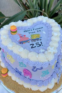 there is a cake that has been decorated with the number twenty five and an airplane on it