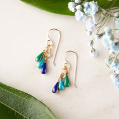 Three colorful, teardrop-shaped confetti beads hang from high-quality earwires. These are the perfect earrings to add a pop of color to your outfit! Earwires are 14k gold-fill. All components are nickel-free and hypoallergenic. Nickel-free 14k Gold Filled Teardrop Earrings, Nickel-free Teardrop Earrings In 14k Gold Filled, Dainty Jewelry With Teardrop Dangling Beads, Dainty Teardrop Jewelry With Dangling Beads, Hypoallergenic 14k Gold Filled Teardrop Earrings, Handmade 14k Gold-filled Teardrop Earrings, Green Teardrop 14k Gold Filled Earrings, 14k Gold Filled Dainty Teardrop Dangle Earrings, Dainty 14k Gold Filled Teardrop Earrings