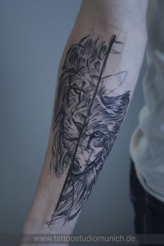 a man with a tattoo on his arm holding a knife and an arrow in the shape of a wolf