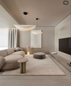 a modern living room with white walls and beige furniture