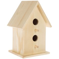 a wooden birdhouse with two holes in the roof