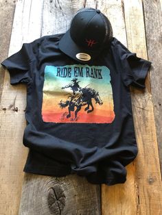 Ride Em Rank T-Shirt - Short Sleeve - Multi color graphic with Bucking Horse - Black - 100% Cotton Pre-Shrunk - Unisex Fit - Adult Sizing ***Hat Sold Separately Granola Outfits, Bucking Horse, Outfit Vaquero, Country Music Shirt, Country Style Outfits, Western Life, T Shirt Design Ideas, Bull Skulls, Western Boho