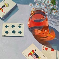 an oil painting of playing cards and a vase with flowers