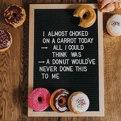 a sign with donuts on it that says i almost looked on a carrot today all i could think was a donut would't never done this to me