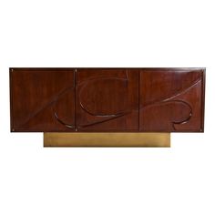 an art deco sideboard with brass accents