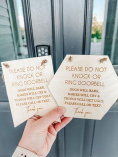 two signs that say please do not knock or ring door bell