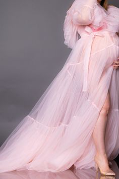 Sheer Maternity Robe, Photoshoot Robe, Pink Sheer Robe Tulle transparent soft pink robe with tulle ruffles can be used for the boudoir photoshoots not only maternity, but non-maternity. Sleeves are decorated with pearl buttons Robe can be used for maternity or non maternity pictures for XS -XL sizes After payment is received gown will be ready to ship in 5-7 business days. I provide worldwide shipping. All items are shipped with registered mail (terms are stated not guaranteed) Orders within USA Pink Fitted Sheer Gown, Pink Fitted Gown With Sheer Details, Feminine Pink Tulle Gown, Sheer Pink Dress For Wedding, Ethereal Sheer Tulle Gown, Pink Fitted Robe For Wedding Night, Floor-length Pink Gown For Wedding Night, Pink Floor-length Gown For Wedding Night, Pink Tulle Maternity Dress For Wedding