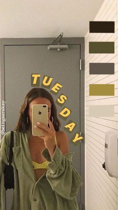 a woman taking a selfie in front of a mirror with the words tuesday on it