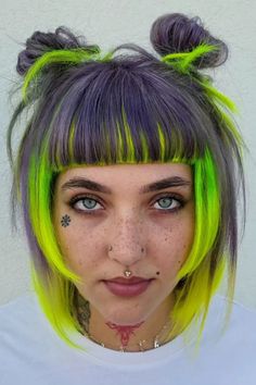 This bold version of the hime haircut has a really striking mix of purple and bright green colors, making it look very vibrant and cool in an edgy way. The hair is cut with straight sides that are the same length as the cheeks and straight bangs across the forehead, a classic part of the hime style, which shows off the face really - Click to see more of Achieve the Perfect Hime Haircut with These 29 Stunning Styles and follow us for more hairstyle ideas. // Photo Credit: Instagram @hairghoulmoe Vivid Colour Hair, Vivid Color Bangs, Rainbow Fringe Hair, Asymmetrical Hair Dye, Blond And Green Hair, Bob With Long Front Pieces, Color Block Bangs Hair, Bicolor Bangs, Purple And Green Hair Ideas