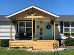 a house with a front porch and covered patio