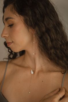 Inspired by the dreamy feeling of looking up into the clouds, the Cloud Collection reimagines historical jewelry elements resulting in timeless, airy, and whimsical jewelry that will have you floating on cloud nine. A freshwater pearl is not mined and shaped. It is born complete and lovely, beneath the water. Baroque pearls are especially "wabi sabi," beautiful in their asymmetry and each one of a kind. ﻿- 6mm freshwater pearls﻿- 18k Vermeil ﻿- About 3 1/2" long Delicate Pearl Pendant Dangle Earrings, Delicate Dangle Pearl Pendant Earrings, White 14k Gold Filled Drop Jewelry, White Delicate Jewelry Gift, White Ethereal Jewelry For Gifts, Minimalist Akoya Pearl Drop Earrings Jewelry, Ethereal Teardrop Jewelry As Gift, Ethereal Teardrop Jewelry Gift, 14k Gold Filled Pearl Drop Jewelry