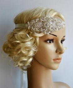 Crystal Applique Headband Ready to ship Beautiful Vintage Style flapper headband. Perfect for a vintage inspired bride, 1920's wedding or Great Gatsby party or any special occasions. All rhinestone and pearls headband. Glamour and stylish Made of : - delicate yet stunning high sparkle rhinestones beaded applique headband - clear and silver beading, rhinestones, crystals and pearls - satin ribbon - your color choice Headband can be put down on the forehead or up on head. Can be worn as a flapper Boho Bridal Headpiece, Crystal Bridal Headband, Flapper Headpiece, Gatsby Headband, Headband Crystal, Pearl Bridal Headband, Rhinestone Headpiece, Flapper Headband, Great Gatsby Party